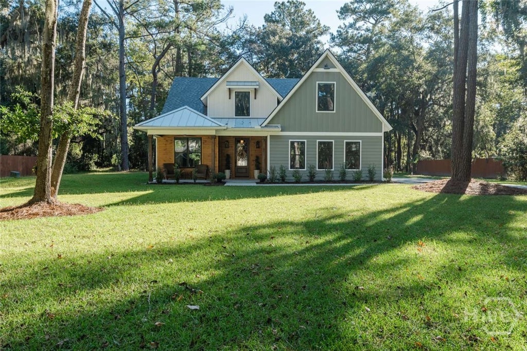Photo of 45 Dutchmans Cove Road, Midway, GA 31320 (MLS # SA367285)