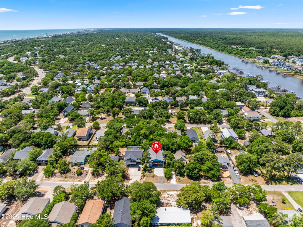 Photo of 119 NE 27th Street, Oak Island, NC 28465 (MLS # 100509934)
