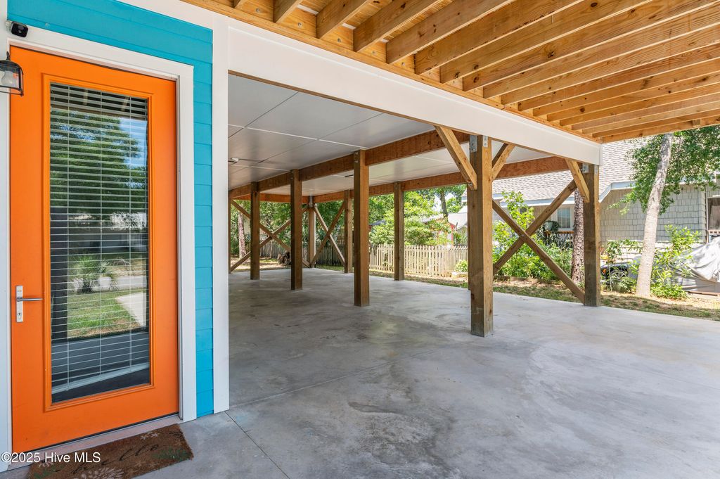 Photo of 119 NE 27th Street, Oak Island, NC 28465 (MLS # 100509934)