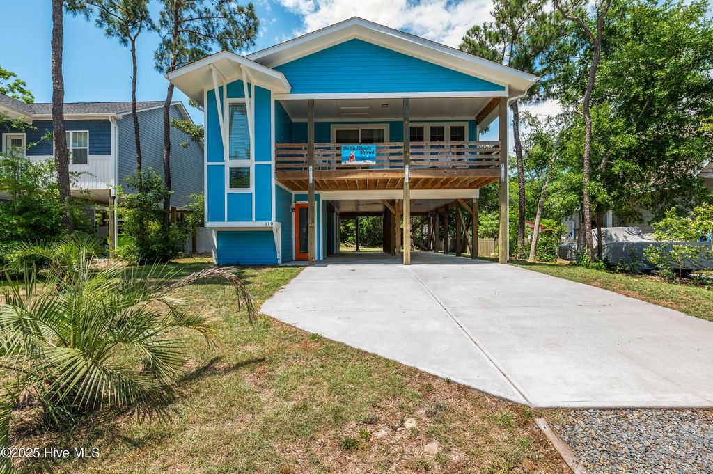 Photo of 119 NE 27th Street, Oak Island, NC 28465 (MLS # 100509934)