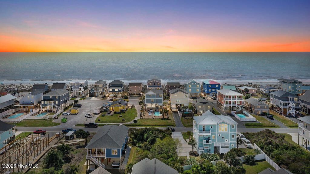 Photo of 4316 E Dolphin Drive, Oak Island, NC 28465 (MLS # 100564763)