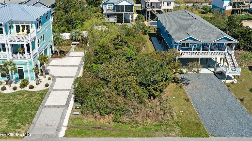 Photo of 4316 E Dolphin Drive, Oak Island, NC 28465 (MLS # 100564763)