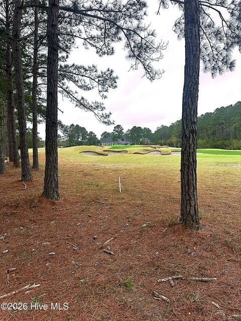 Photo of 6223 Castlebrook Way SW, Ocean Isle Beach, NC 28469 (MLS # 100560174)