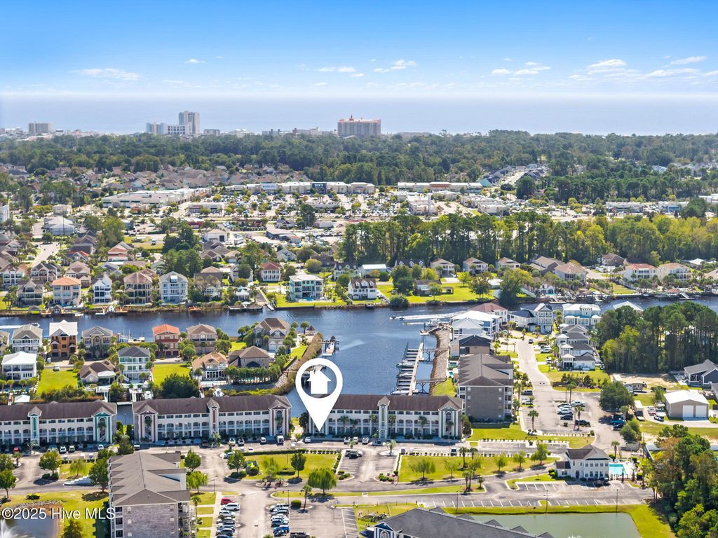 Photo of 4516 N Plantation Harbour Drive #H1, Little River, SC 29566 (MLS # 100535578)