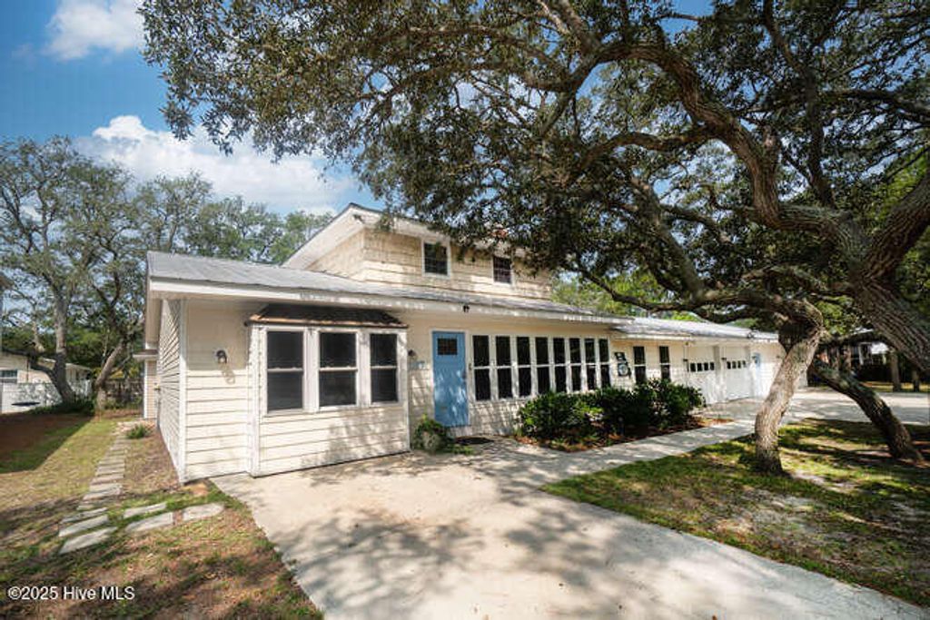 Photo of 137 NW 9th Street, Oak Island, NC 28465 (MLS # 100528759)
