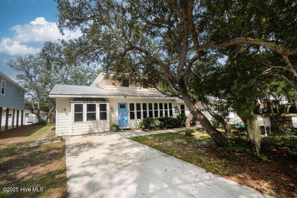 Photo of 137 NW 9th Street, Oak Island, NC 28465 (MLS # 100528759)