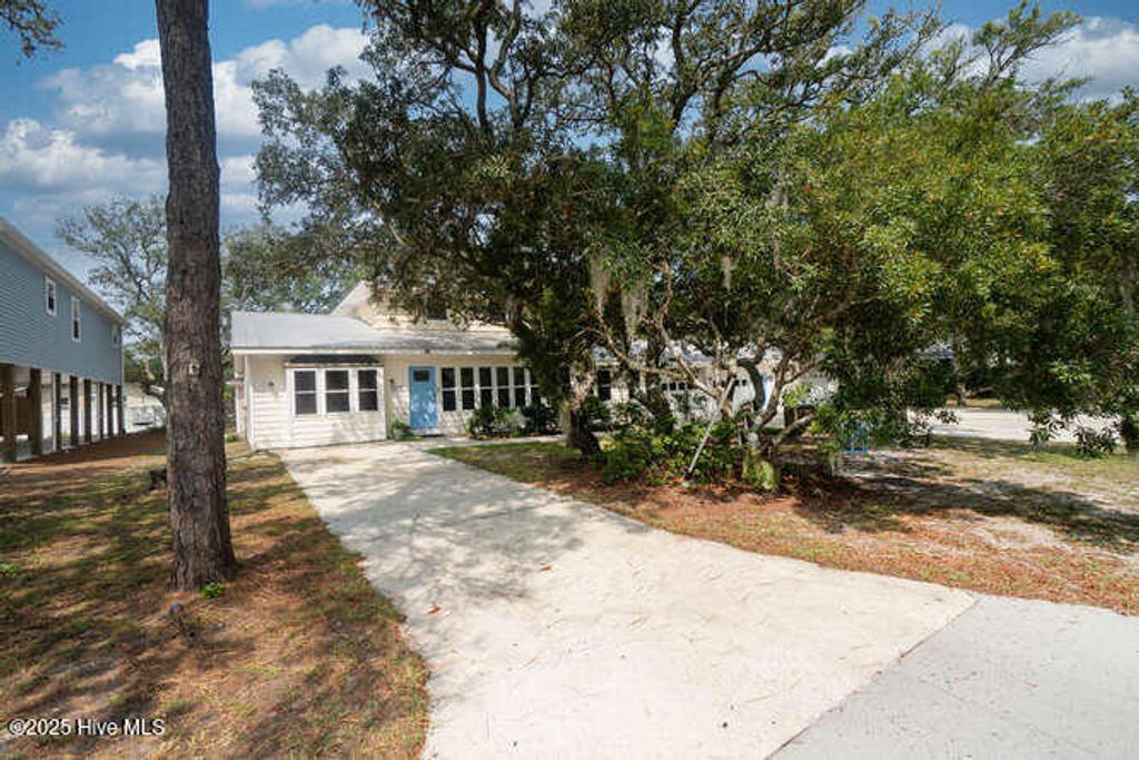 Photo of 137 NW 9th Street, Oak Island, NC 28465 (MLS # 100528759)