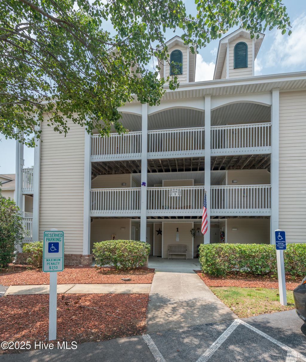 Photo of 3350 Club Villas Drive #104, Southport, NC 28461 (MLS # 100513341)