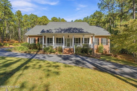 Photo of 104 Mccracken Drive, West End, NC 27376 (MLS # 100611419)