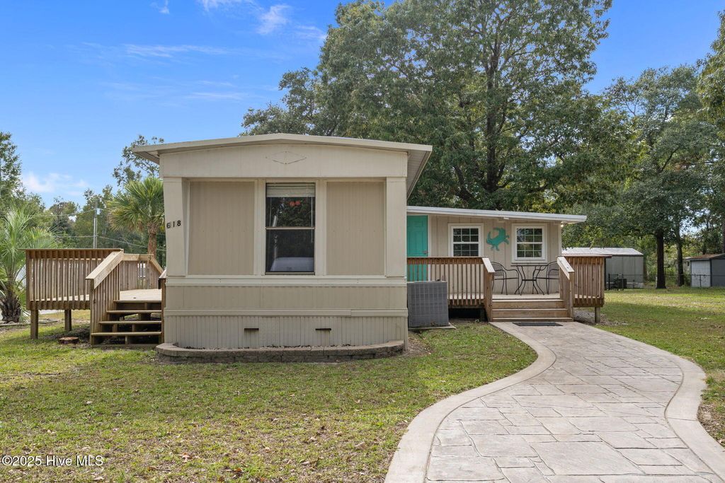 Photo of 618 Creek Drive, Hampstead, NC 28443 (MLS # 100535152)