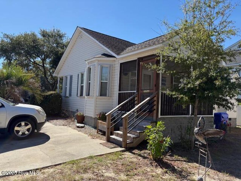 Photo of 2308 E Oak Island Drive, Oak Island, NC 28465 (MLS # 100538319)