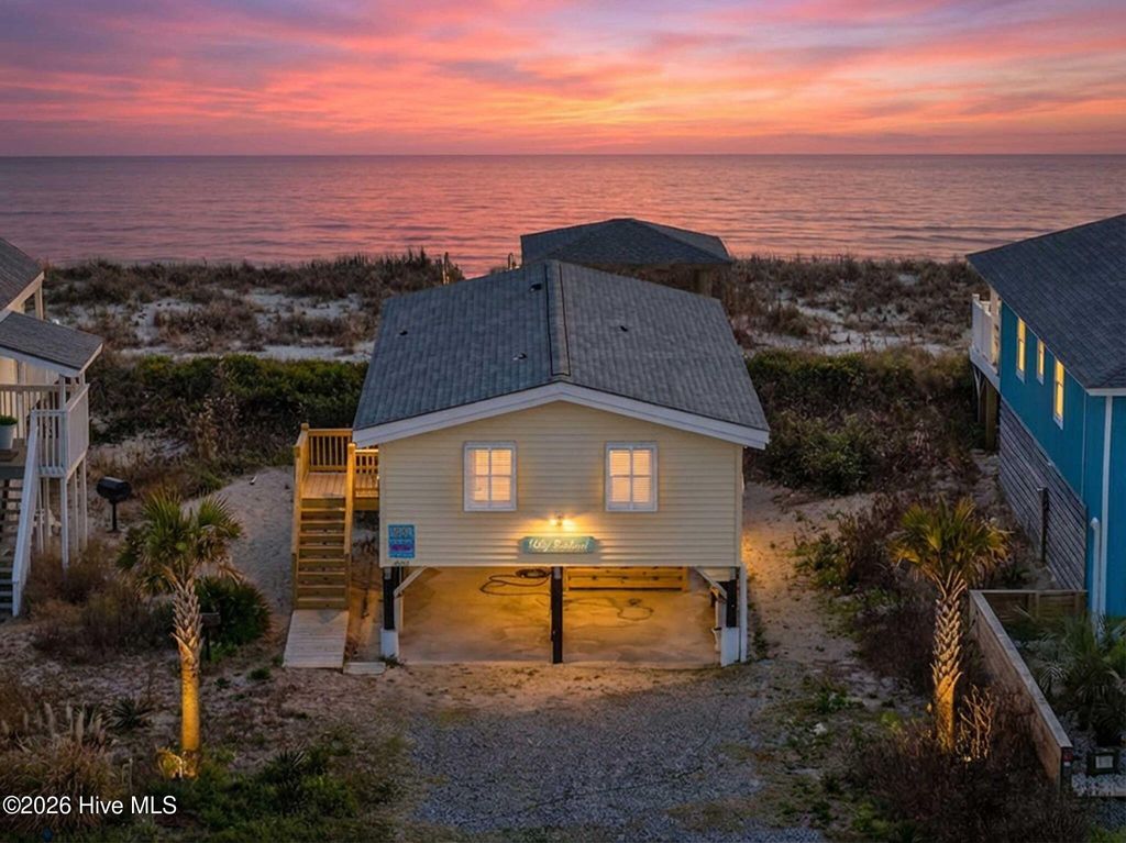 Photo of 2521 W Beach Drive, Oak Island, NC 28465 (MLS # 100559967)