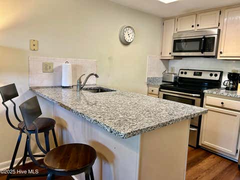 Tiny photo for 118 Dock Street #Apt 8, Wilmington, NC 28401 (MLS # 100586295)