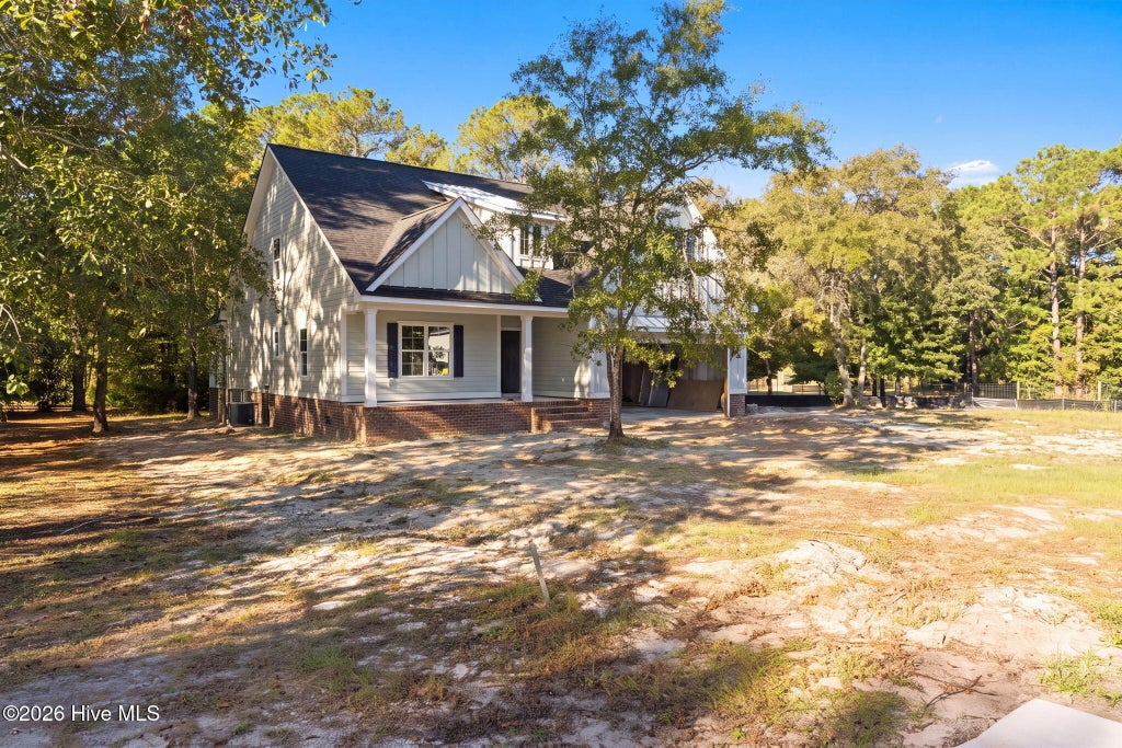 Photo of 1803 Forbes Bay Lane SE, Bolivia, NC 28422 (MLS # 100612759)