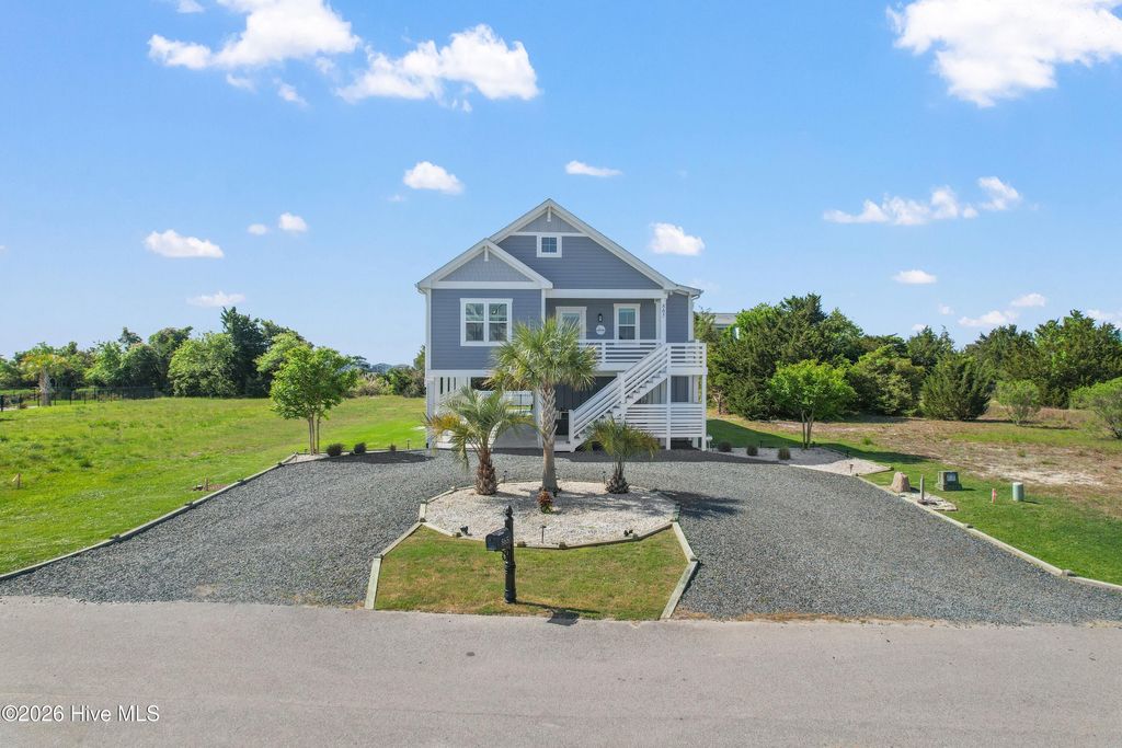 Photo of 865 Heron Landing Wynd, Holden Beach, NC 28462 (MLS # 100567916)