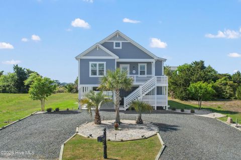 Photo of 865 Heron Landing Wynd, Holden Beach, NC 28462 (MLS # 100567916)
