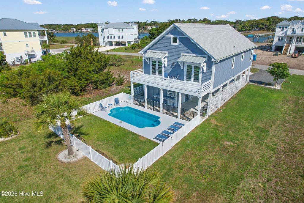 Photo of 865 Heron Landing Wynd, Holden Beach, NC 28462 (MLS # 100567916)