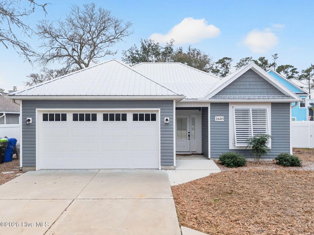Photo of 2605 E Oak Island Drive, Oak Island, NC 28465 (MLS # 100557627)