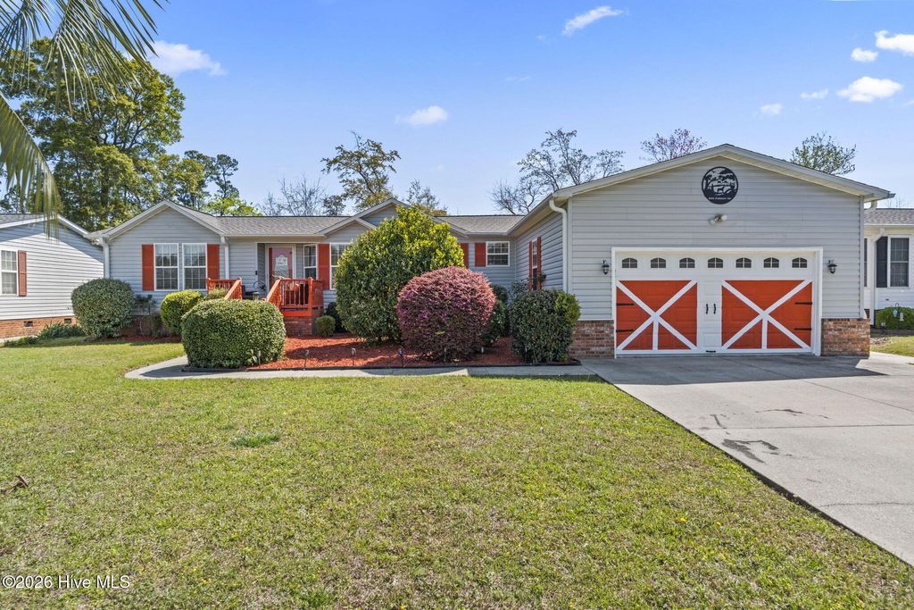 Photo of 891 Palmer Drive, Carolina Shores, NC 28467 (MLS # 100563458)