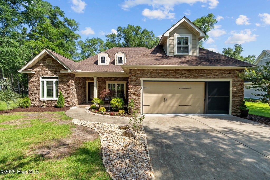 Photo of 9134 Ocean Harbour Golf Club Road SW, Calabash, NC 28467 (MLS # 100593467)
