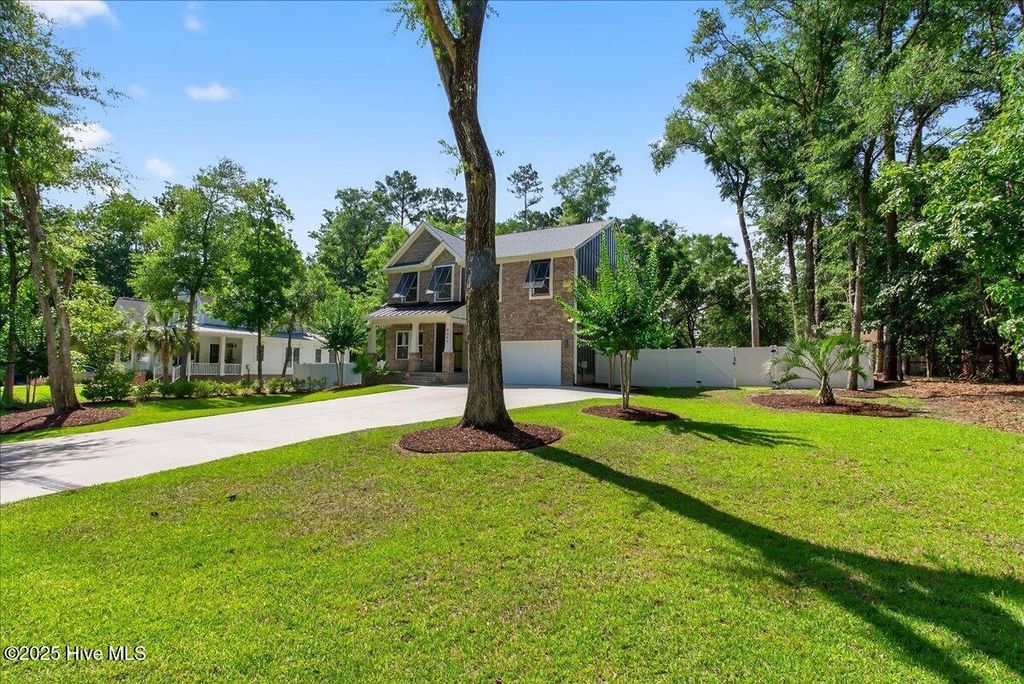 Photo of 9066 Ocean Harbour Golf Club Road SW, Calabash, NC 28467 (MLS # 100514096)