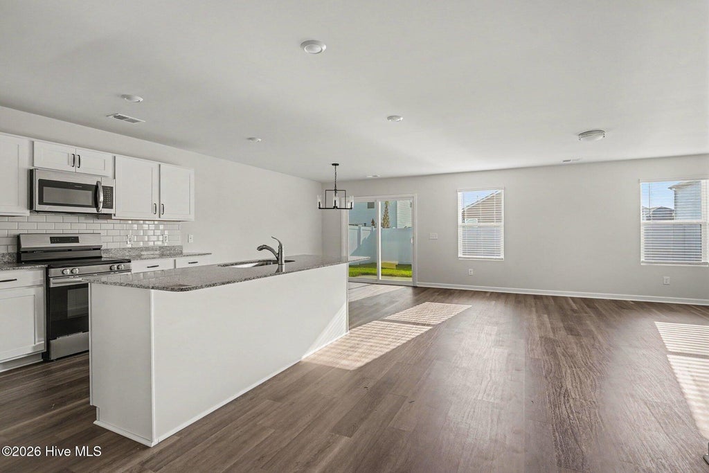 Photo of 258 Red Ridge Ln Sw LN, Sunset Beach, NC 28468 (MLS # 100603420)