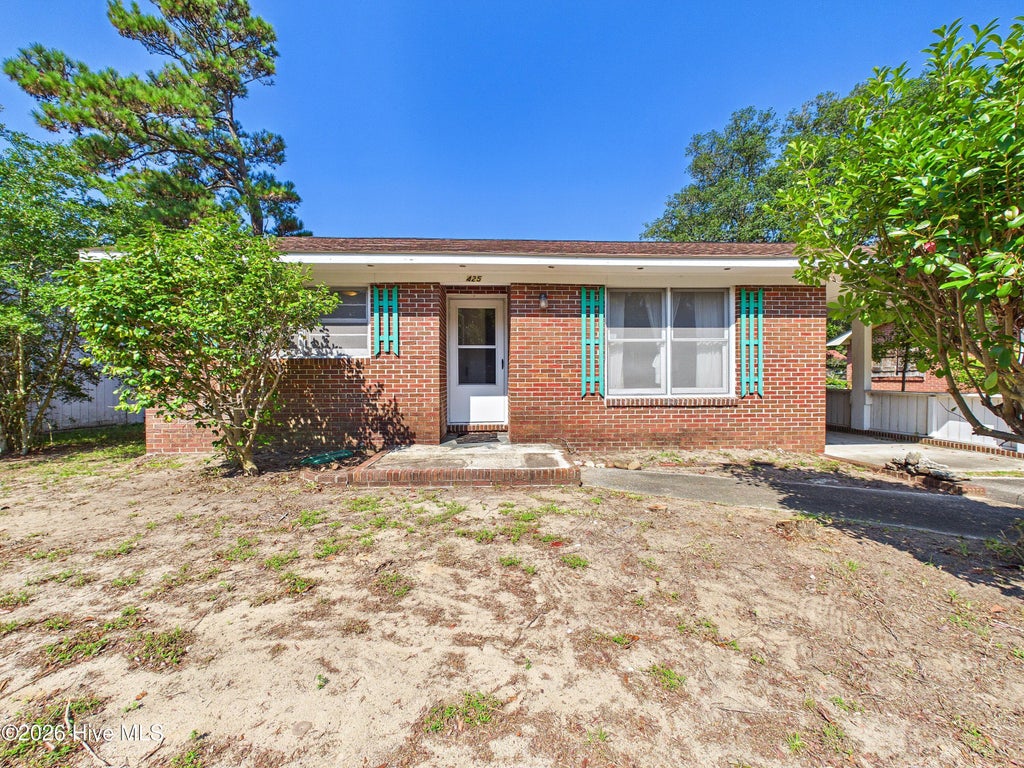 Photo of 425 Norton Street, Oak Island, NC 28465 (MLS # 100599205)