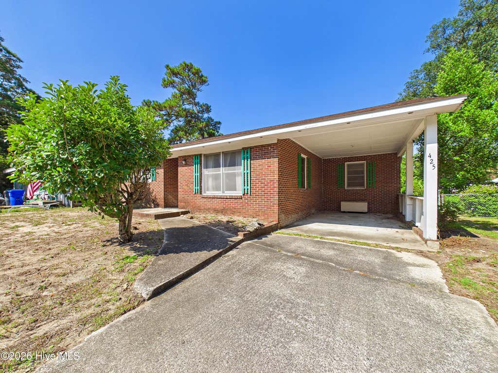 Photo of 425 Norton Street, Oak Island, NC 28465 (MLS # 100599205)