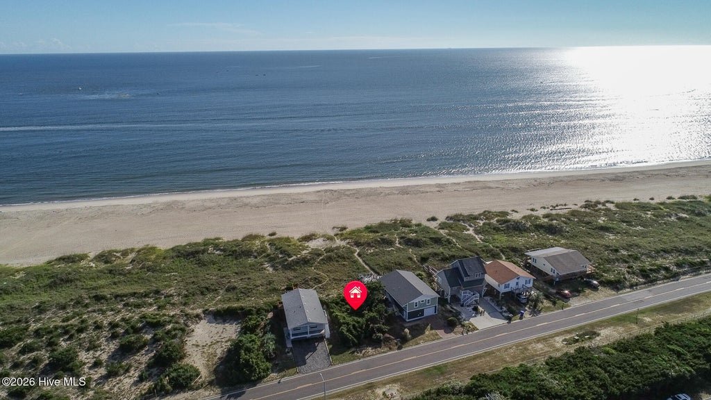 Photo of 705 Caswell Beach Road, Caswell Beach, NC 28465 (MLS # 100608229)
