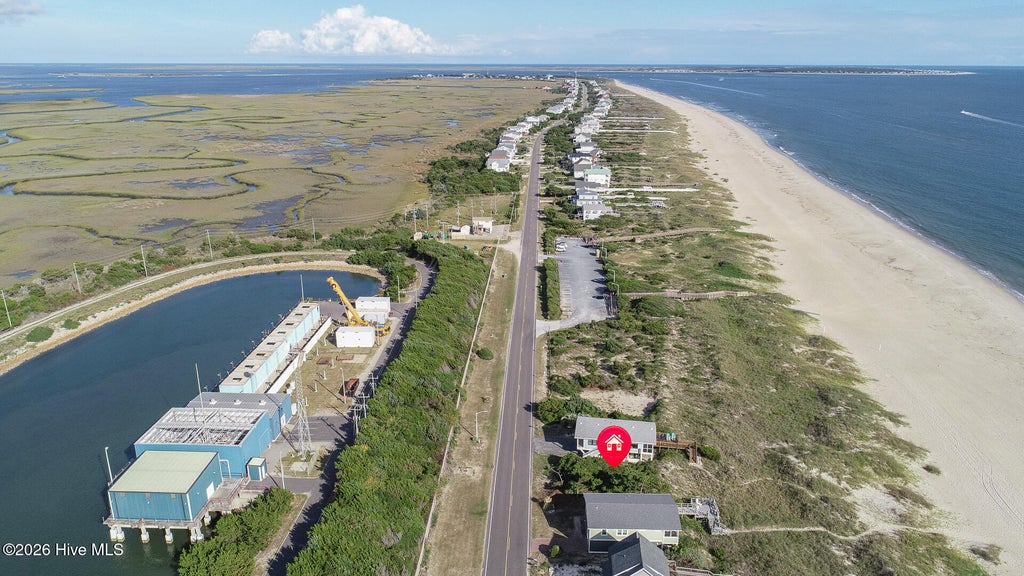 Photo of 705 Caswell Beach Road, Caswell Beach, NC 28465 (MLS # 100608229)