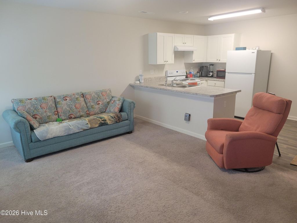 Photo of 187 Shamrock Drive SW, Sunset Beach, NC 28468 (MLS # 100566971)