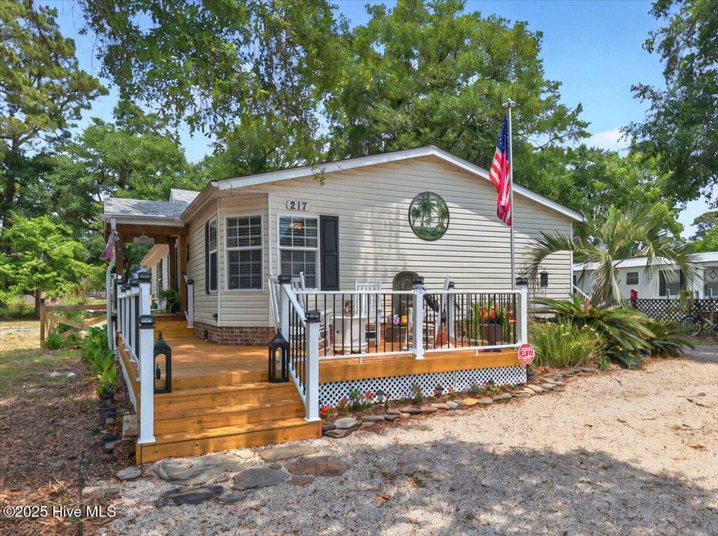 Photo of 217 Magnolia Drive, Sunset Beach, NC 28468 (MLS # 100555131)