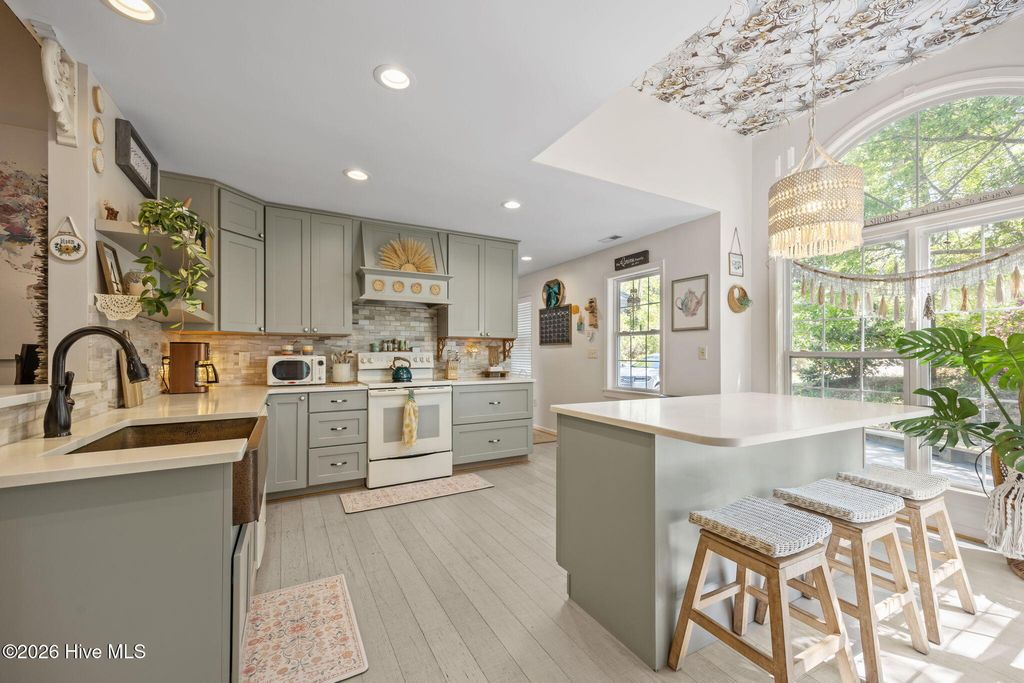 Photo of 111 Mimosa Boulevard, Pine Knoll Shores, NC 28512 (MLS # 100570285)
