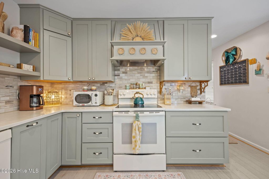 Photo of 111 Mimosa Boulevard, Pine Knoll Shores, NC 28512 (MLS # 100570285)