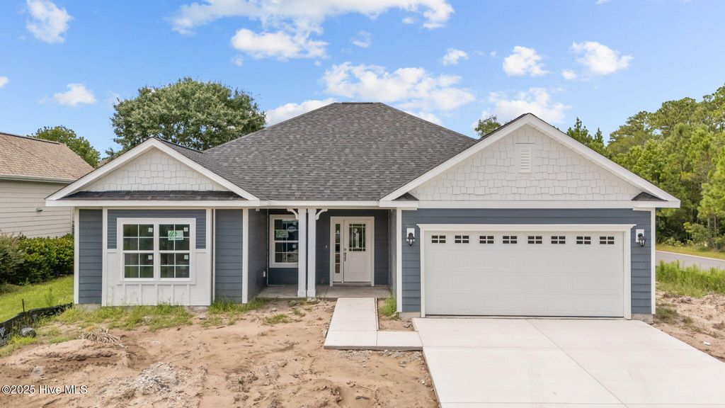Photo of 3145 Burberry Lane SW, Shallotte, NC 28470 (MLS # 100523816)