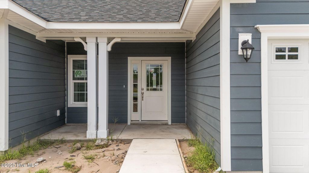 Photo of 3145 Burberry Lane SW, Shallotte, NC 28470 (MLS # 100523816)