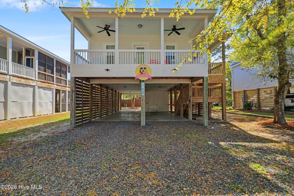 Photo of 168 NW 6th Street, Oak Island, NC 28465 (MLS # 100566458)