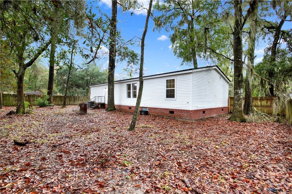Photo of 58 Saint Catherine Street, Midway, GA 31320 (MLS # SA345130)