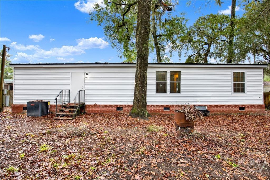 Photo of 58 Saint Catherine Street, Midway, GA 31320 (MLS # SA345130)