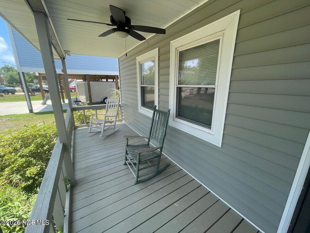Photo of 141 NE 33rd Street, Oak Island, NC 28465 (MLS # 100564016)