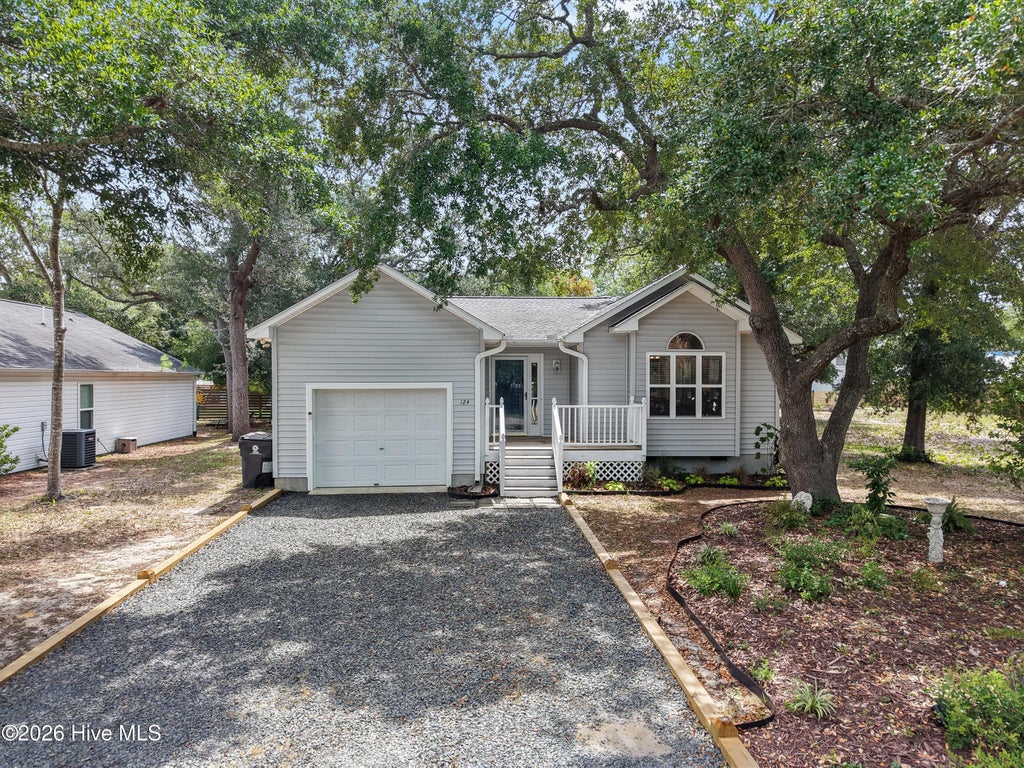 Photo of 124 NW 8th Street, Oak Island, NC 28465 (MLS # 100591343)