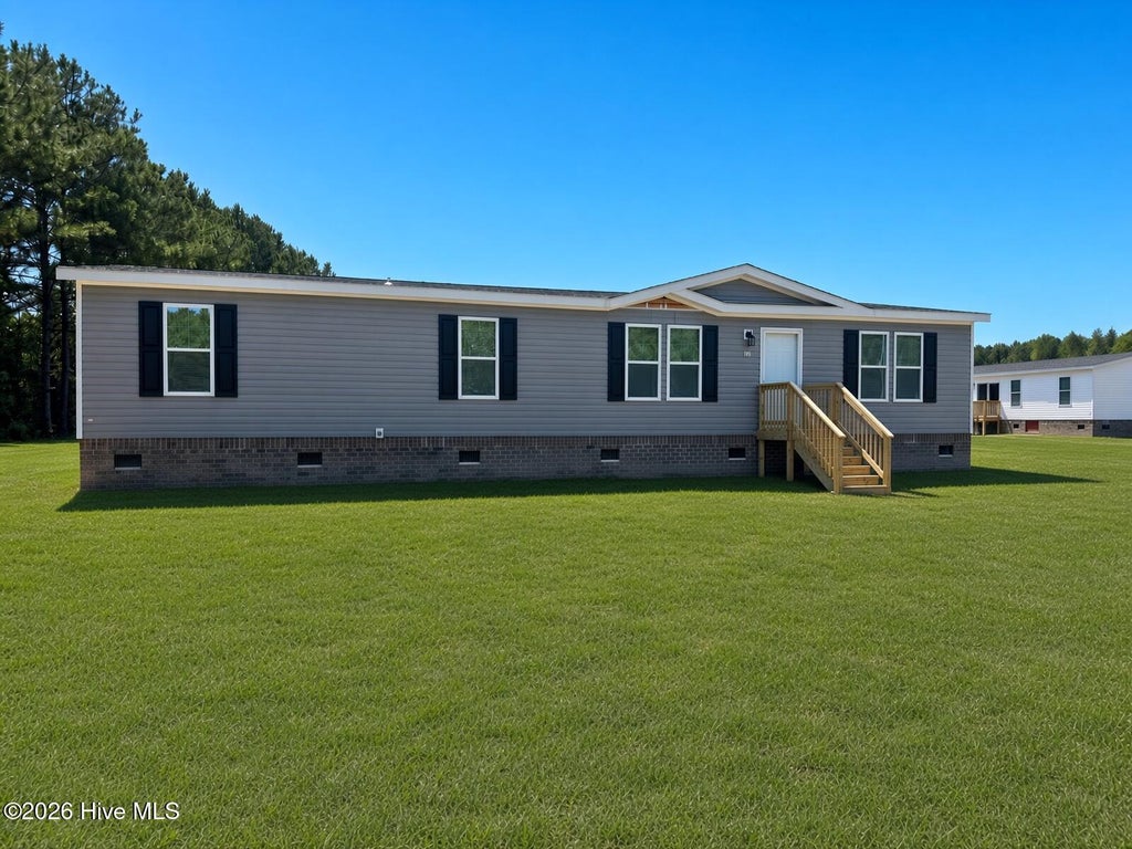 Photo of 212 Mt Moriah Church Road, Whiteville, NC 28472 (MLS # 100601624)