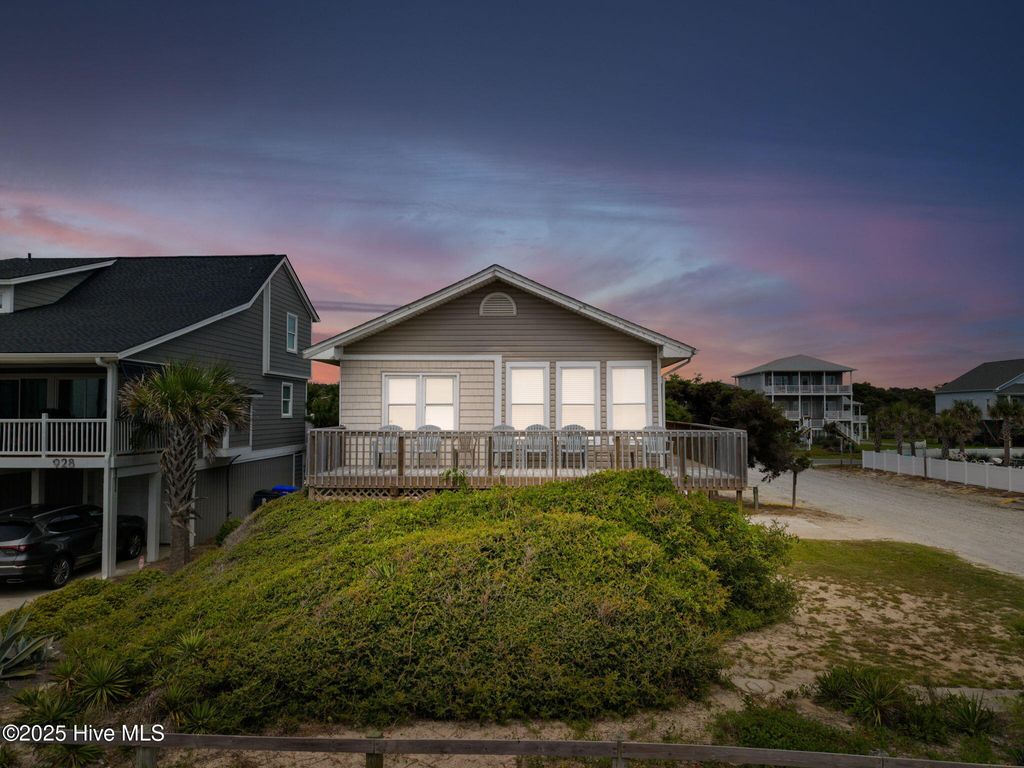 Photo of 930 E Beach Drive, Oak Island, NC 28465 (MLS # 100526809)
