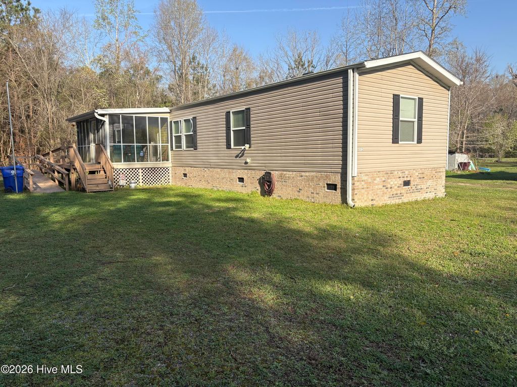 Photo of 312 Fire Tower Road, Lake Waccamaw, NC 28450 (MLS # 100563107)