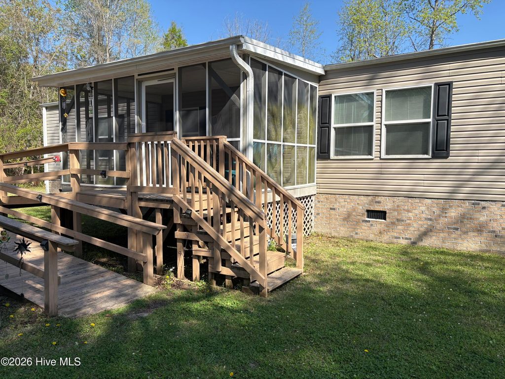 Photo of 312 Fire Tower Road, Lake Waccamaw, NC 28450 (MLS # 100563107)