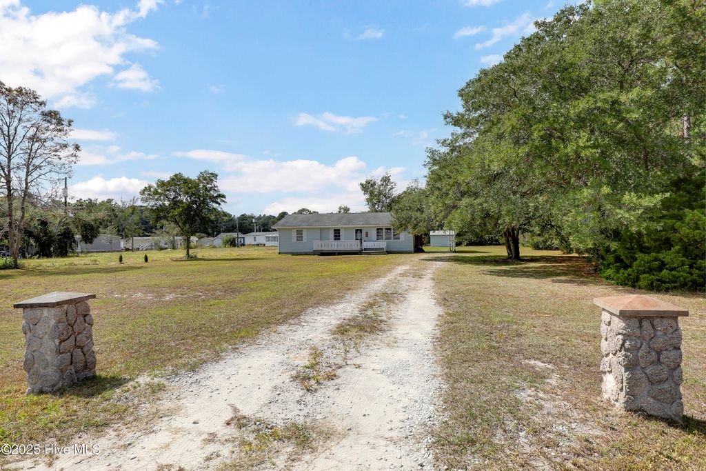 Photo of 767 E Ocean Road, Holly Ridge, NC 28445 (MLS # 100533401)