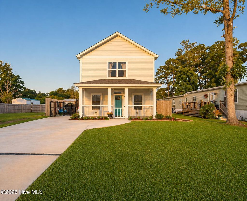 Photo of 218 NE 76th Street, Oak Island, NC 28465 (MLS # 100570387)