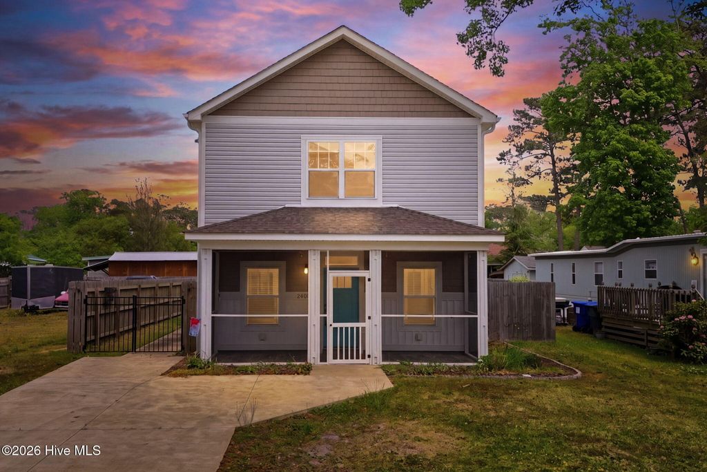 Photo of 218 NE 76th Street, Oak Island, NC 28465 (MLS # 100570387)