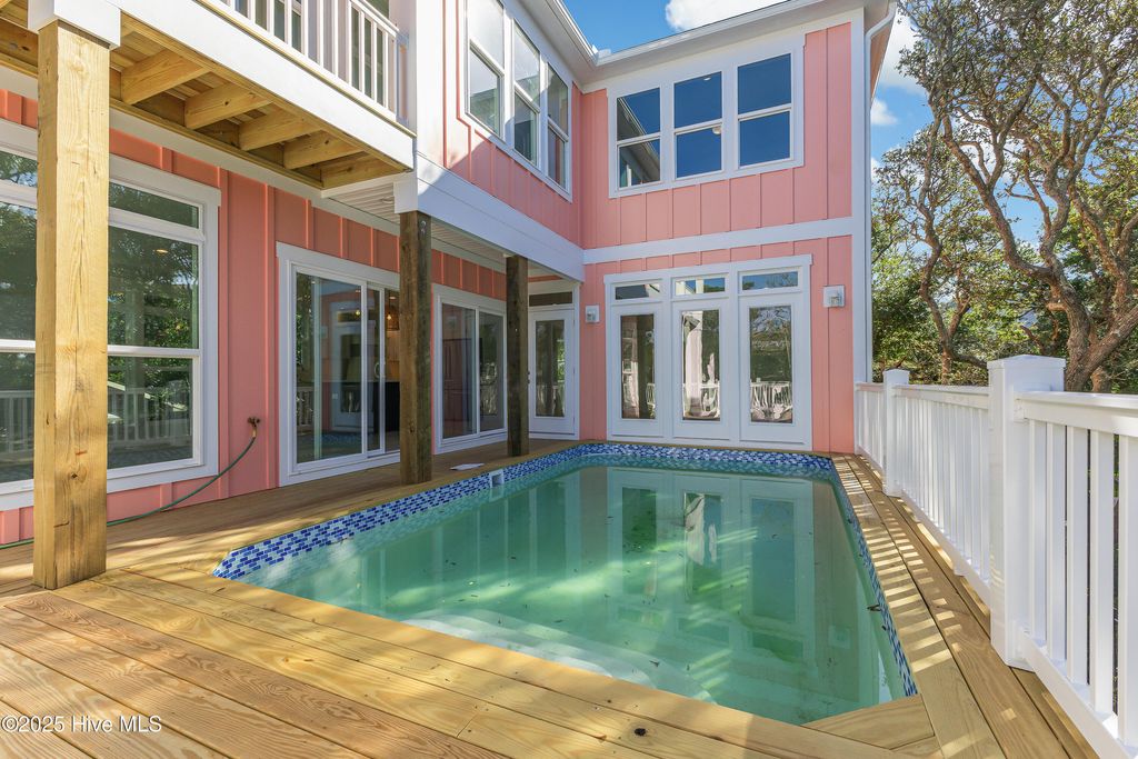 Photo of 114 SE 75th Street, Oak Island, NC 28465 (MLS # 100535613)