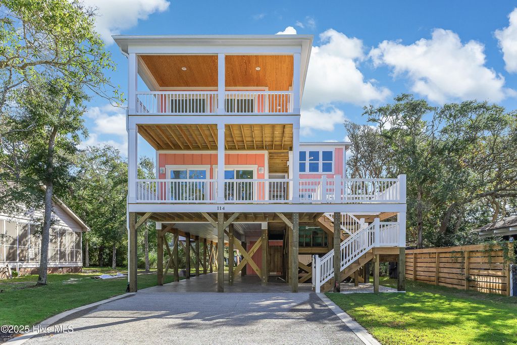 Photo of 114 SE 75th Street, Oak Island, NC 28465 (MLS # 100535613)